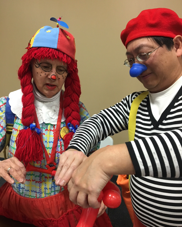 2018 North American Muslim Foundation, Scarborough, Toronto, Canada's Family Day. Tripper and Deigo twist a balloon monkey head. So much fun!