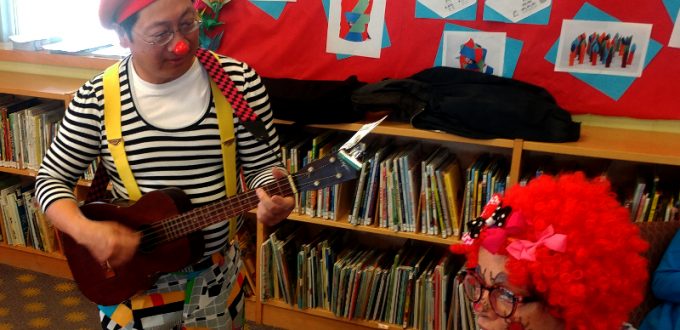 Toronto Public Library, Centennial Branch (Bathurst/Finch), Open House, Scarborough Corp of Clowns Deigo and Junebug singing some songs. Photo by Nisha Prajapati